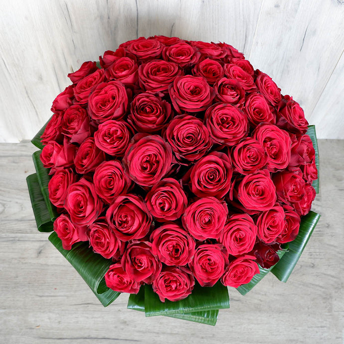 50 Long Stem Red Roses With Ti Leaves