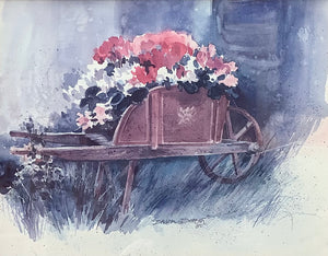 Wheelbarrow with flowers